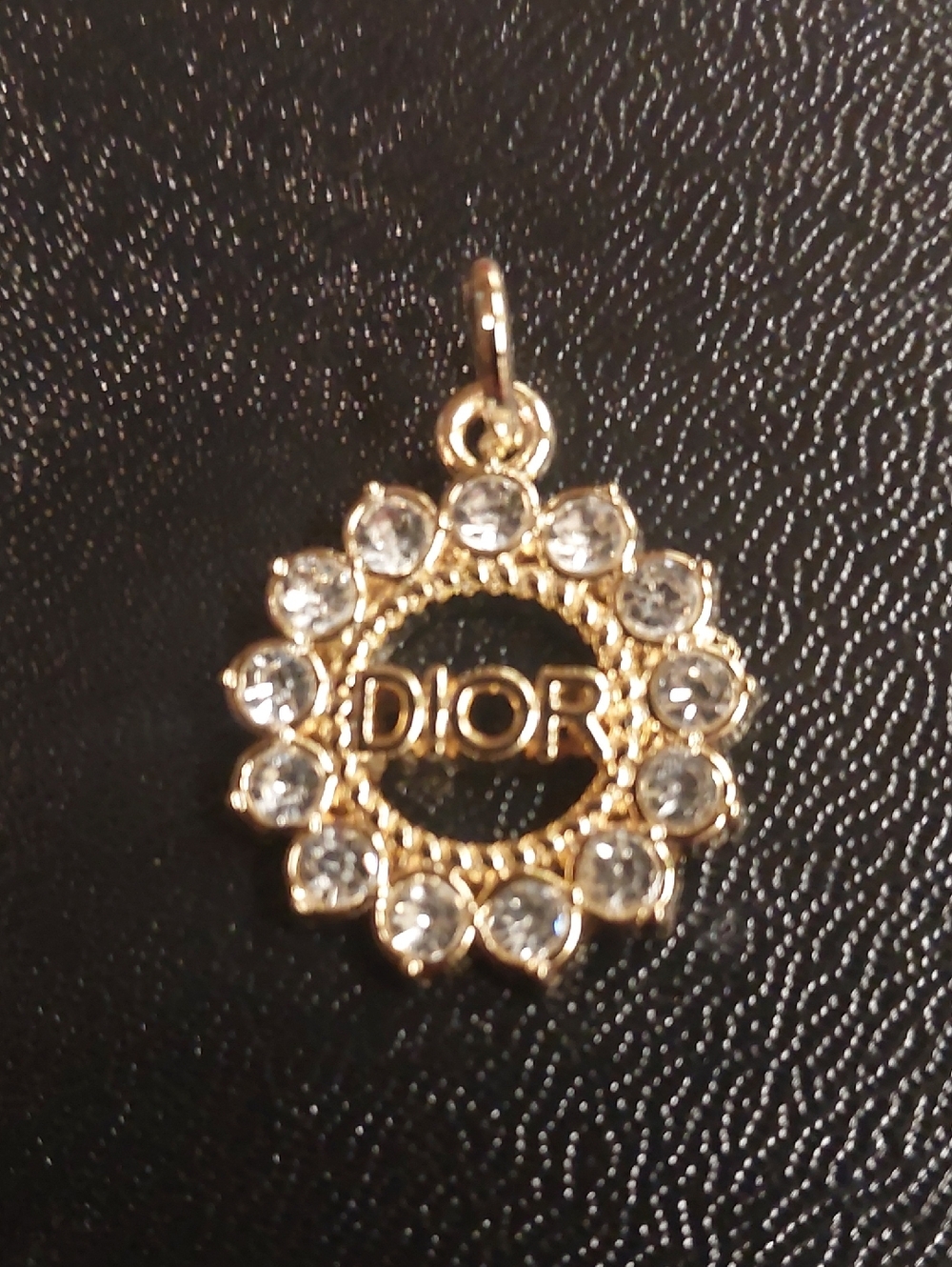 CD Gold and Clear Crystal Circular Logo Charm Pendant. 1/$17 or 2/$25 Charms.